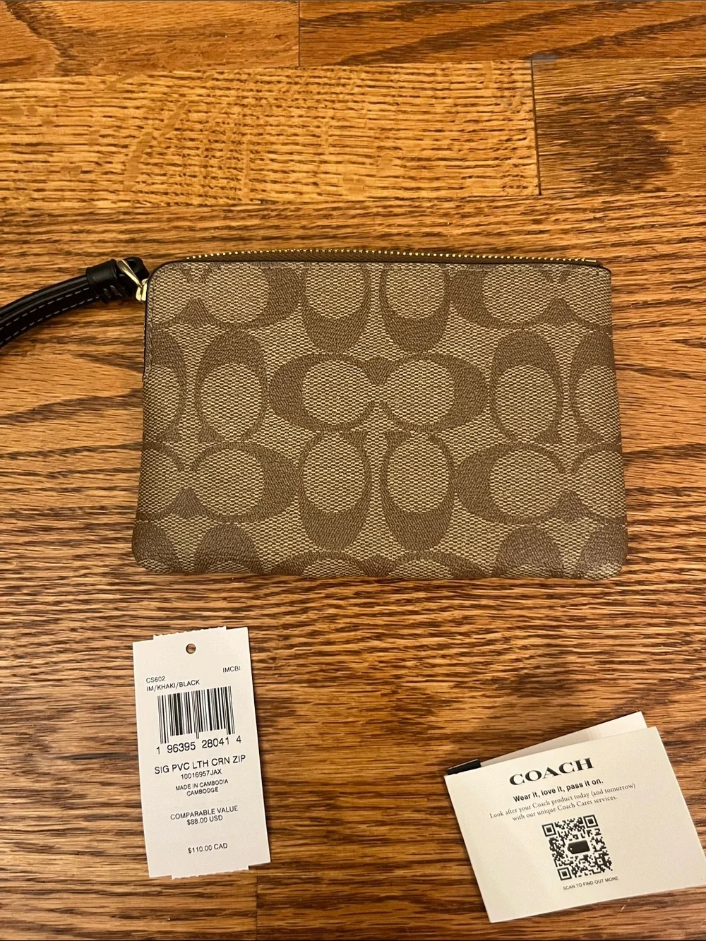 Coach Brown Monogram Wristlet with Black Stripe and Gold Hardware
